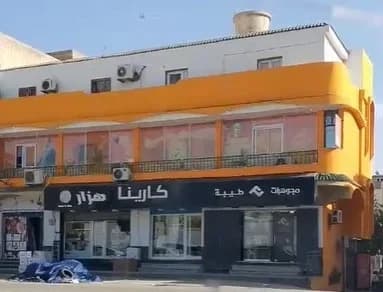 مبنى استثماري متعدد الأغراض بمدخول شهري ممتاز – طريق السور 📈 1